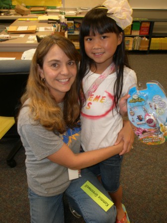 Kasen and her 1st grade teacher